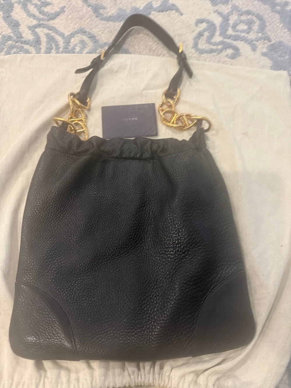 Prada Black Leather Shoulder Bag with Gold Chain Accent